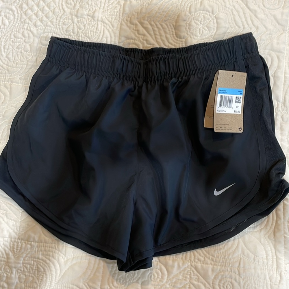 NWT Nike Women’s Dri-fit black on black shorts. Medium